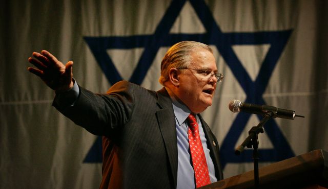 CUFI leader John Hagee speaks to Israel supporters at a rally at the Jerusalem convention centre in 2008