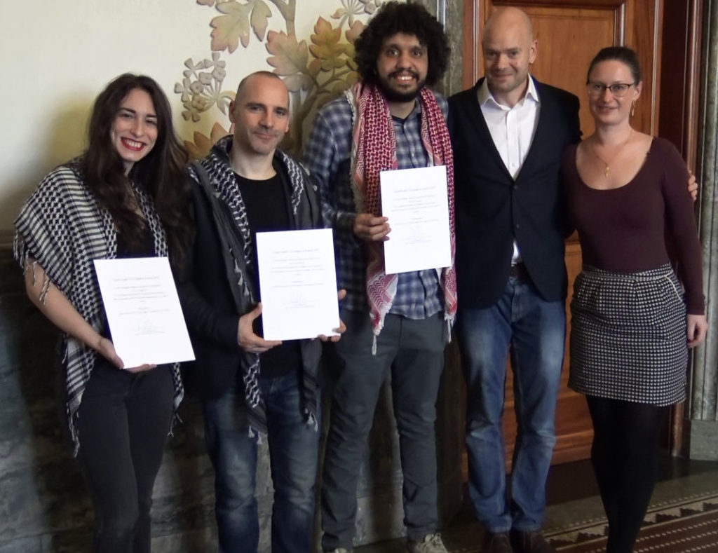 he Humboldt 3, Stavit Sinai, Ronnie Barkan, and Majed Abusalama, receive an award from Copenhagen’s Mayor for Technical and Environmental Affairs, Ninna Hedeager Olsen (far right) in February 2019.